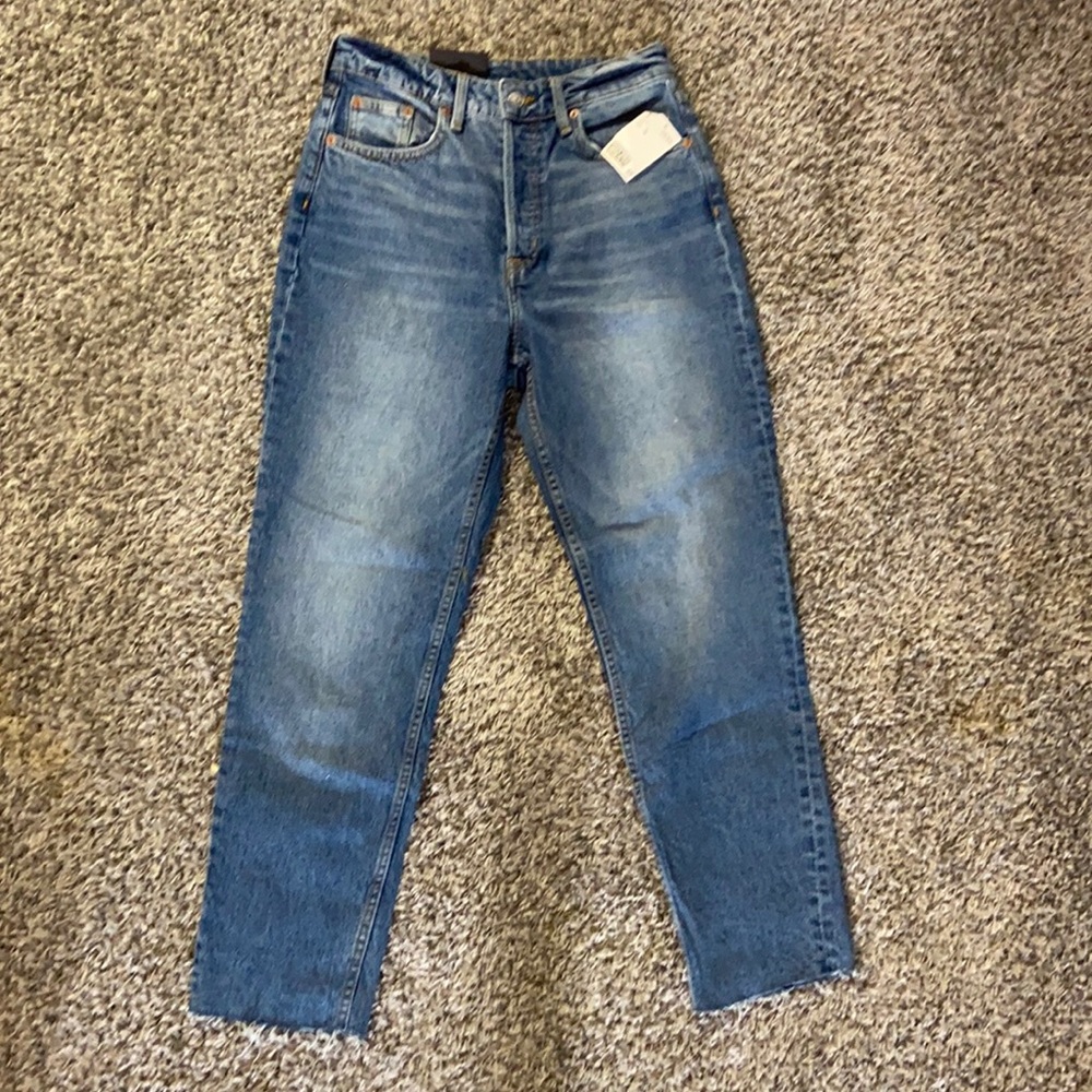Mid-wash high waisted mom jeans